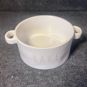 Rae Dunn "BAKE" white casserole dish with off-white lettering; Studio Collection